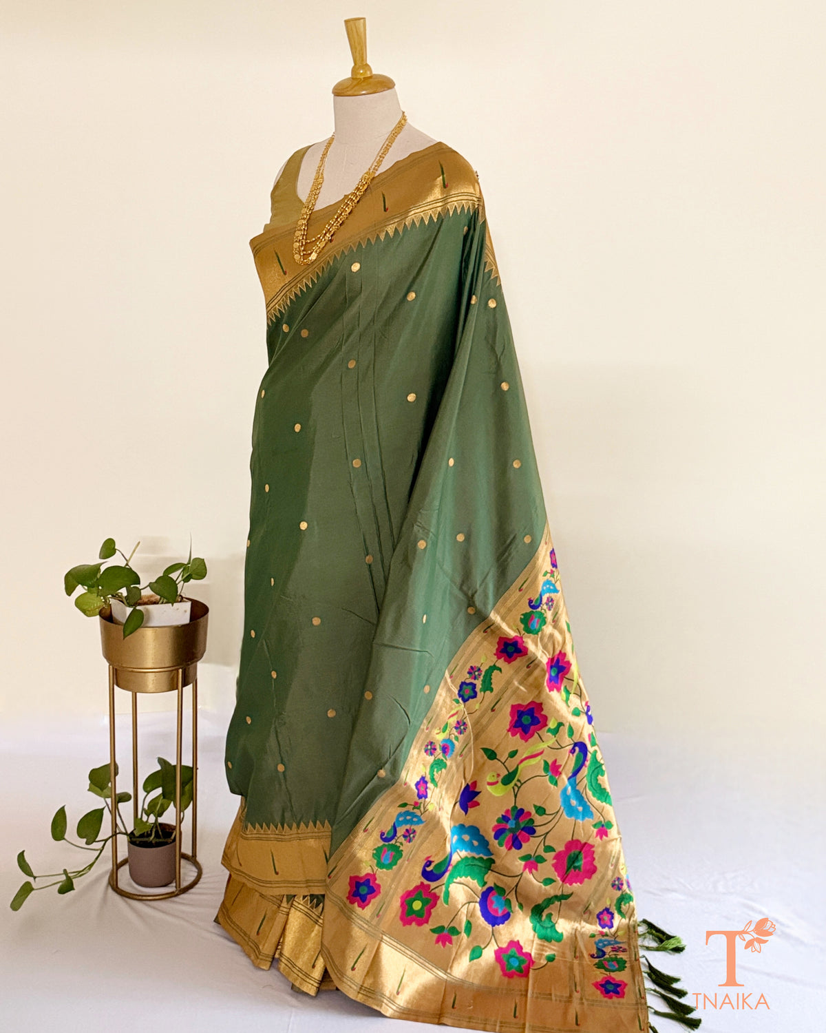 Semi silk saree featuring decorative Paithani-style pallu