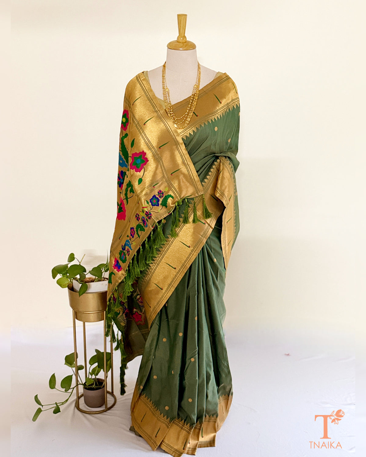 Paithani-inspired saree with colourful traditional pallu motifs
