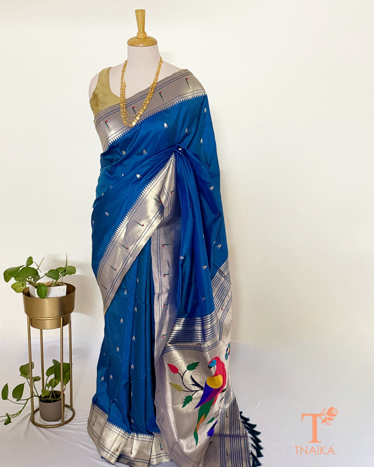 Paithani-inspired saree with colourful traditional pallu motifs
