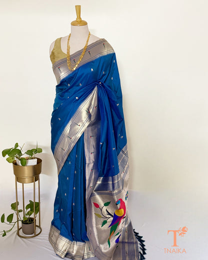 Paithani-inspired saree with colourful traditional pallu motifs