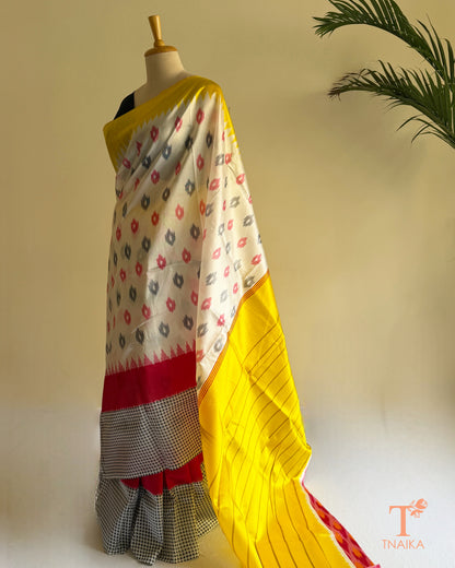 Artistic printed satin silk saree in navy, teal, and ivory tones with statement ethnic design