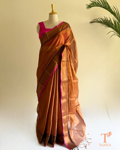 Lightweight tissue silk saree with a beautiful metallic sheen