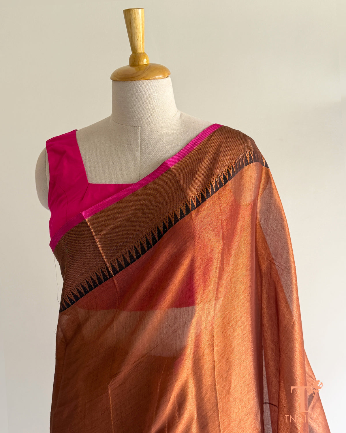 Tissue silk saree with rich sheen and graceful drape