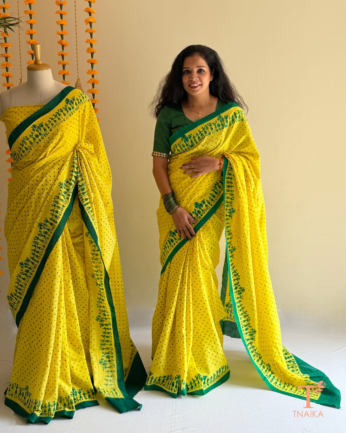 Pure Mul cotton saree with polka dot print and Warli art border