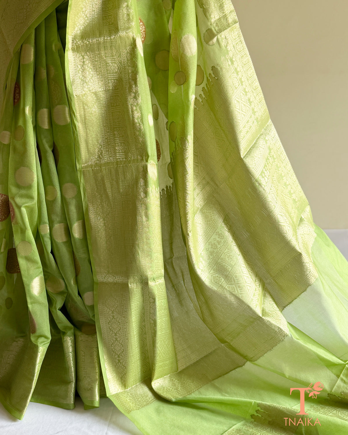 Traditional Banarasi organza saree with delicate floral boota motifs
