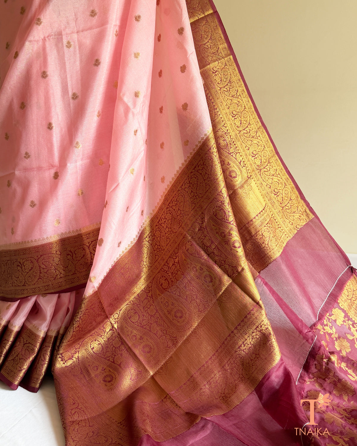 Blush pink Banarasi silk saree with intricate traditional pallu