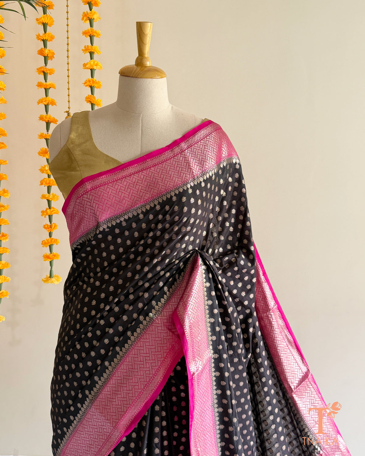 Traditional black zari woven saree for festive occasions