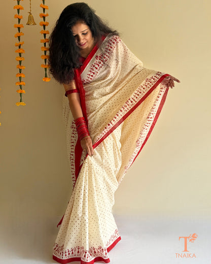 Mul cotton saree with polka dots and traditional folk art detailing