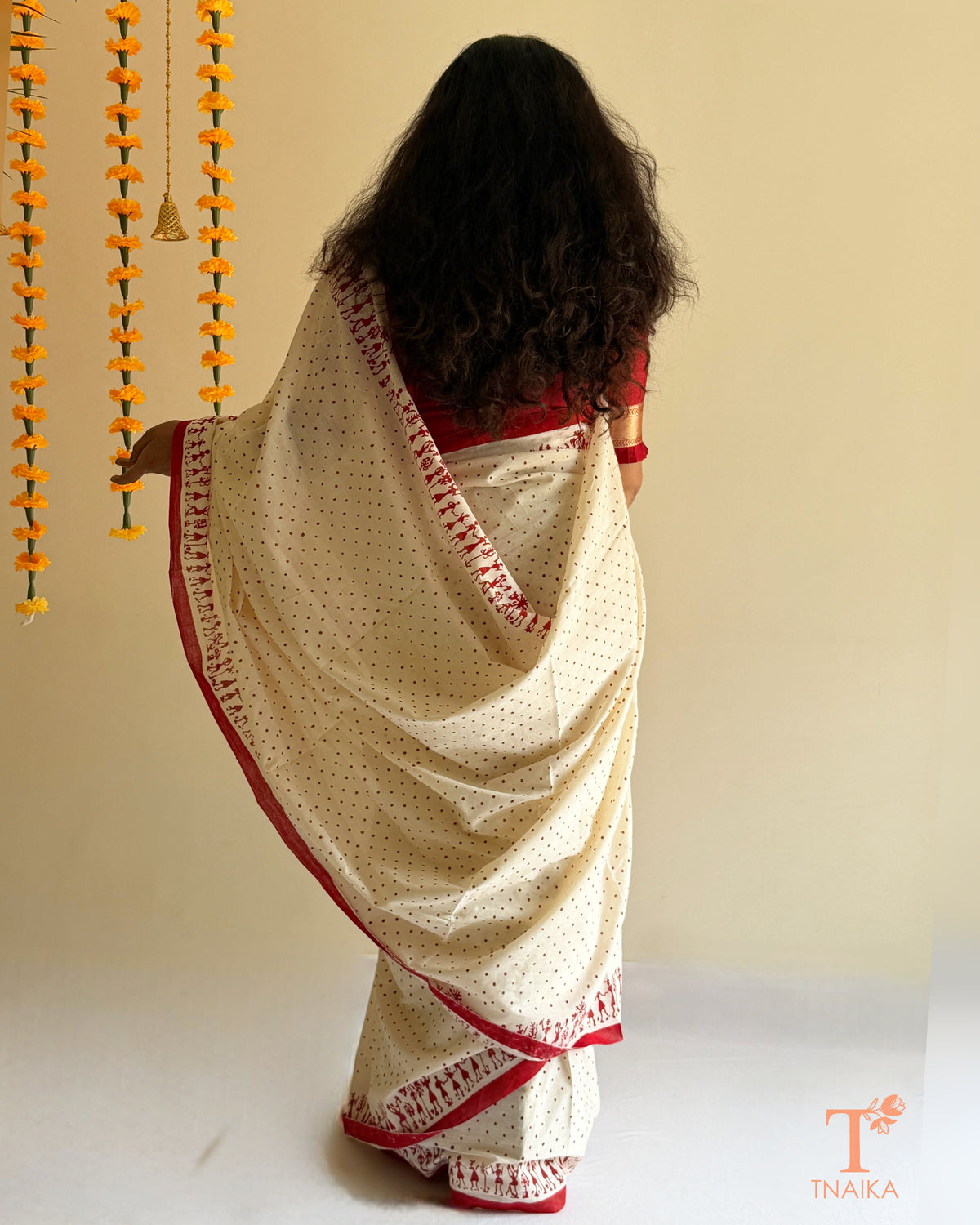 Pure cotton saree with traditional Warli-style border and matching blouse fabric
