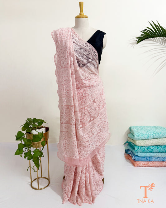 Blush pink full jaal Chikankari hand embroidered saree with floral threadwork.