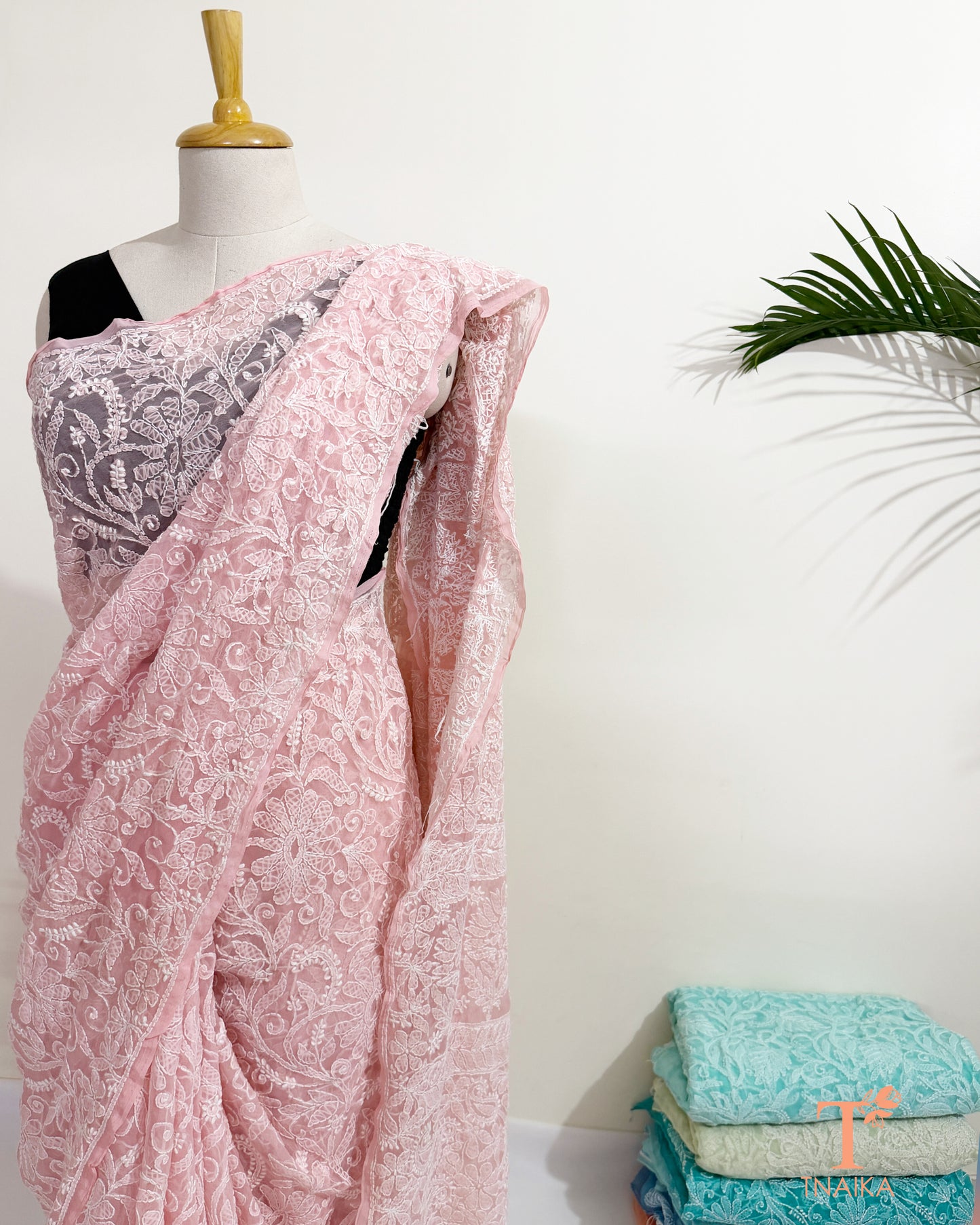 Blush pink full jaal Chikankari hand embroidered saree with floral threadwork.