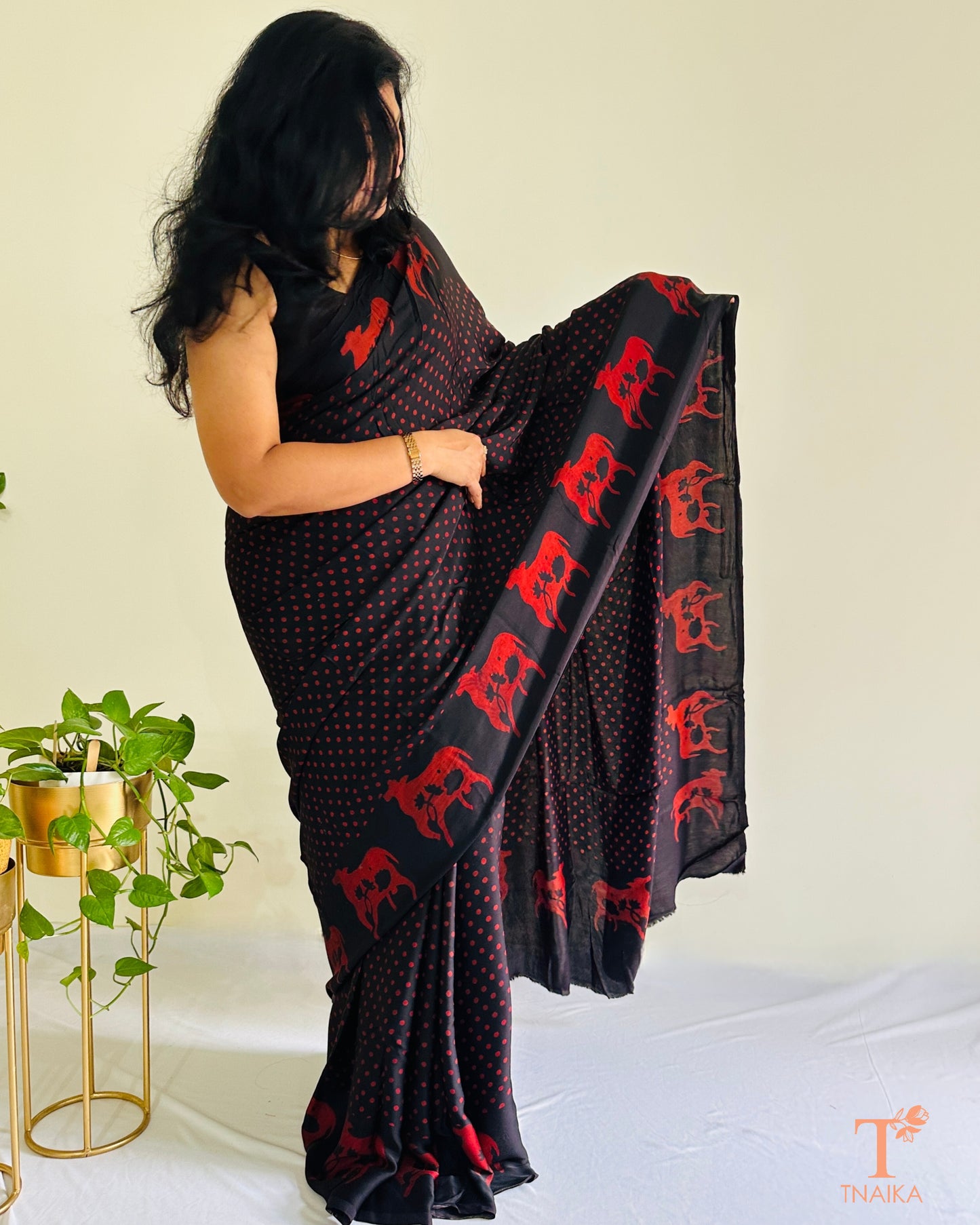 Designer modal silk saree showcasing Indian sacred motifs