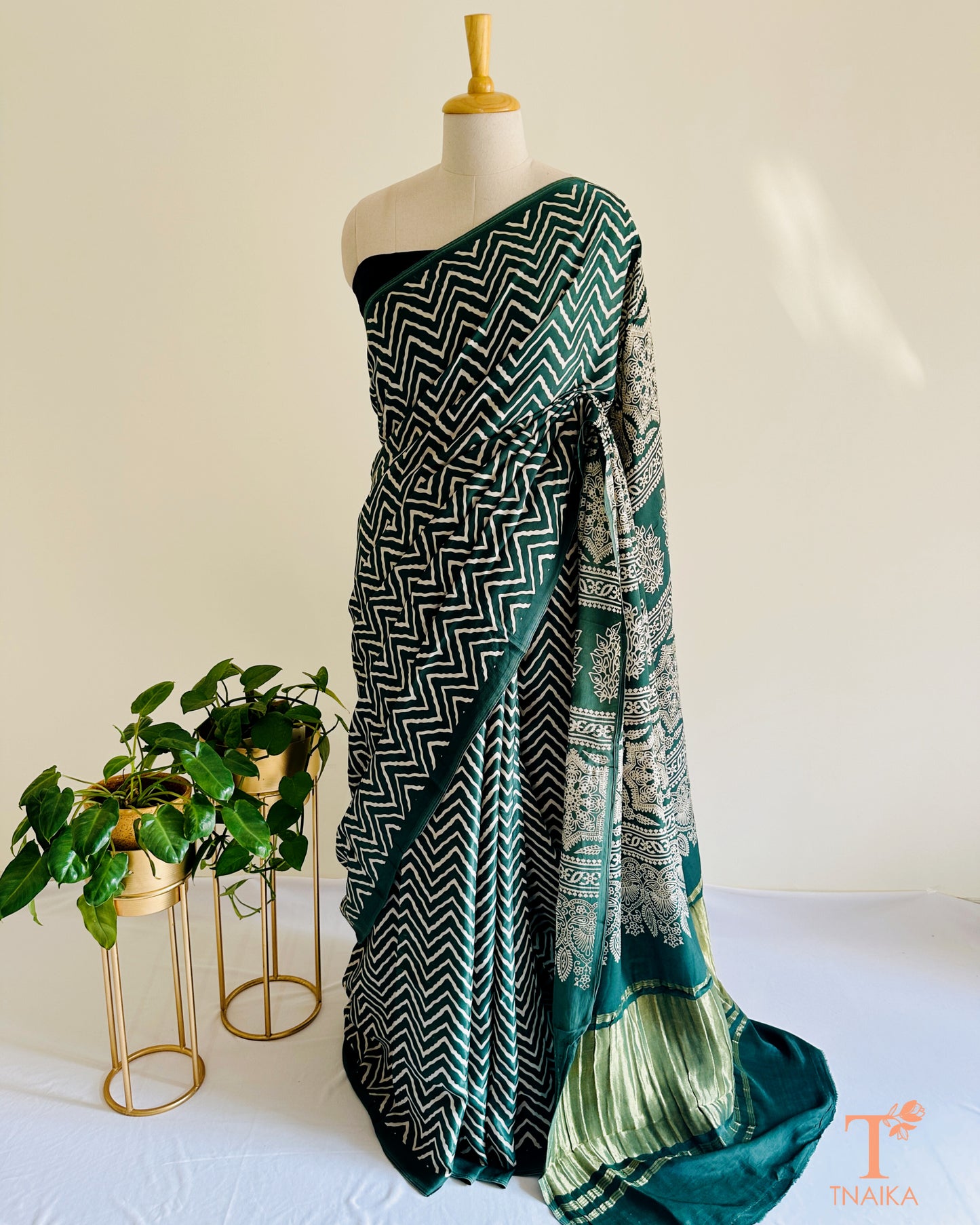 Festive modal silk saree with classic leheriya pattern, tissue lagadi patta-style pallu and Ajrakh accents, includes bandhani running blouse.