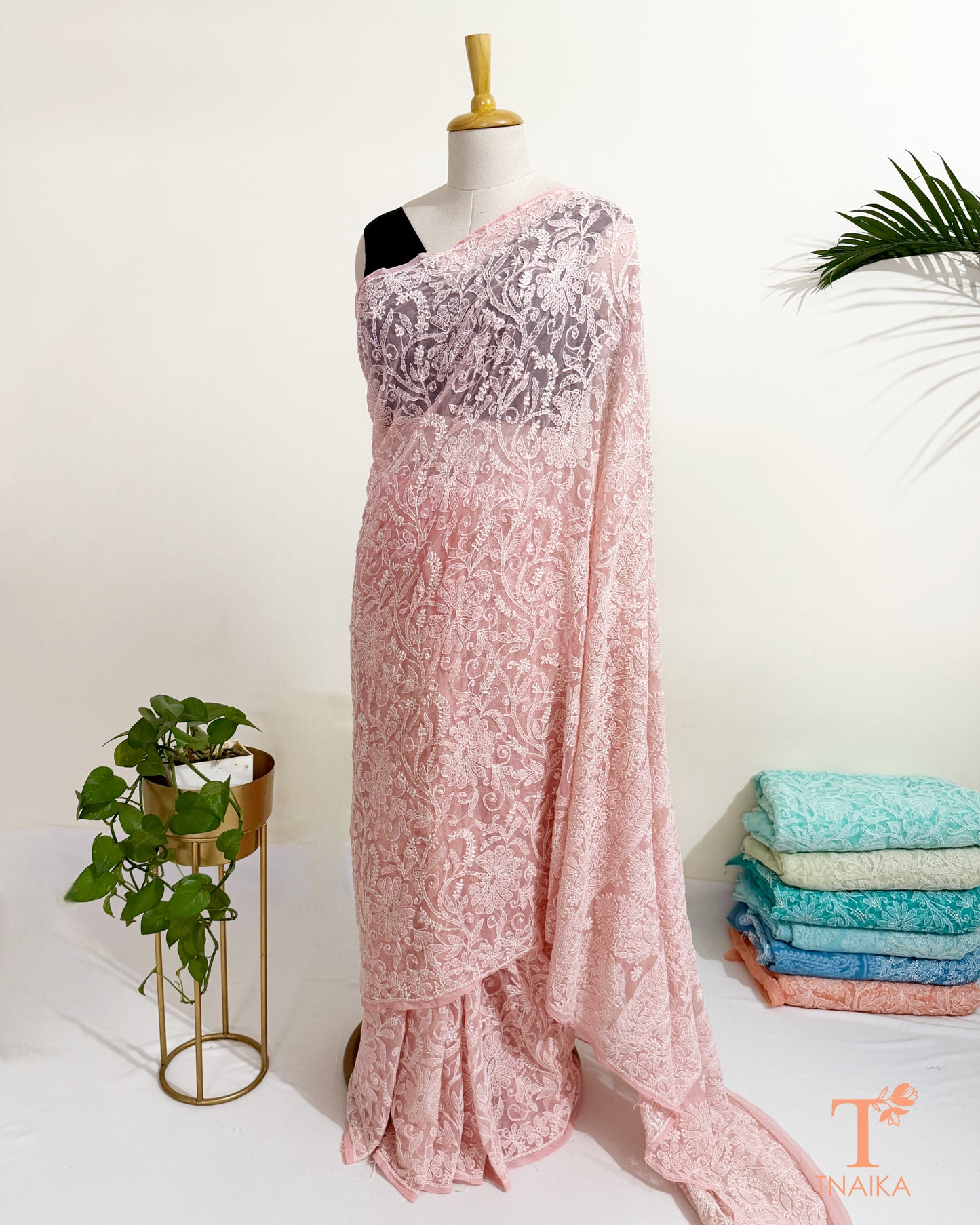 Traditional hand embroidered Chikankari saree in soft blush pink with all-over floral jaal.