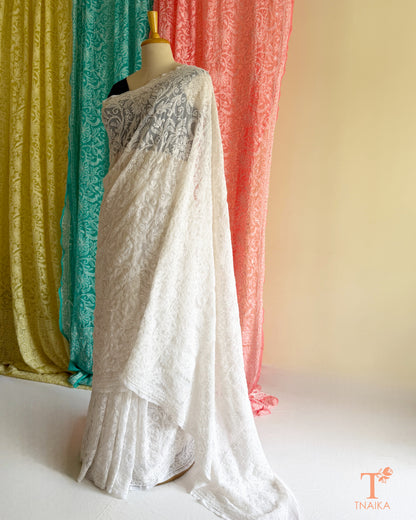 Embroidered Chikankari saree showcasing traditional Lucknowi craftsmanship with intricate floral jaal.
